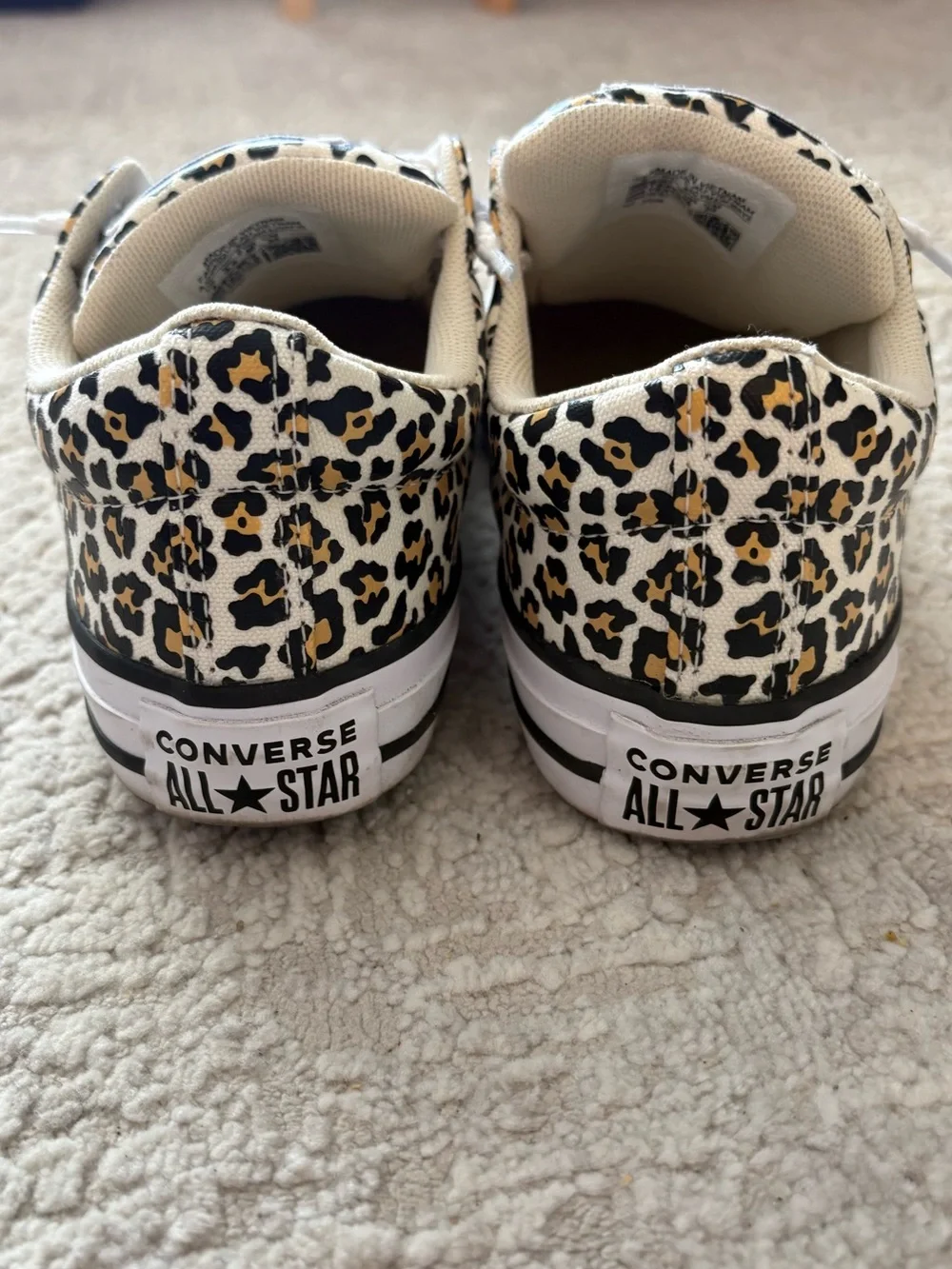 Converse Kids Leopard Print Low Top Sneakers in White, Black, Tan